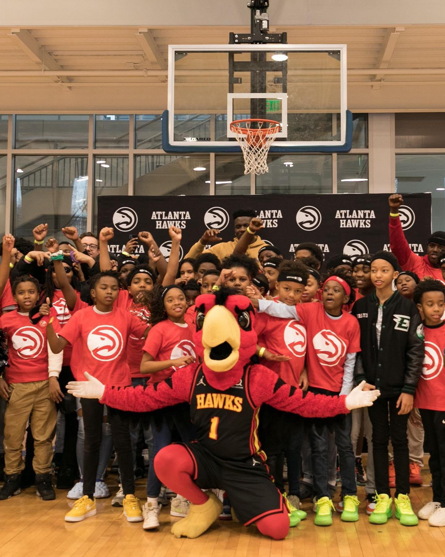 image  1 We partnered with the #atlhawks to teach kids how to create code to make Harry the Hawk dunk